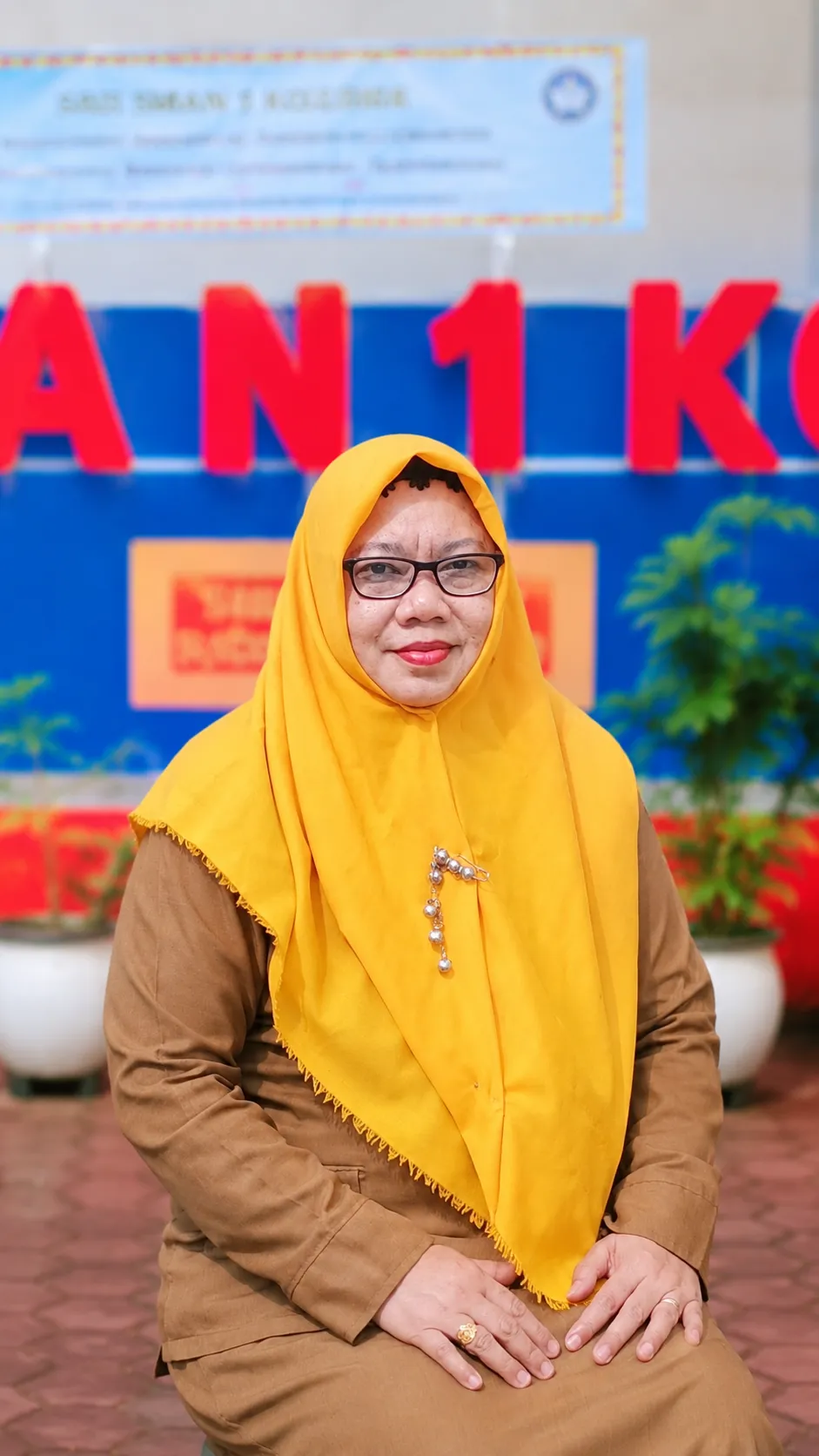 ERWINA SARI S.Ag MM.