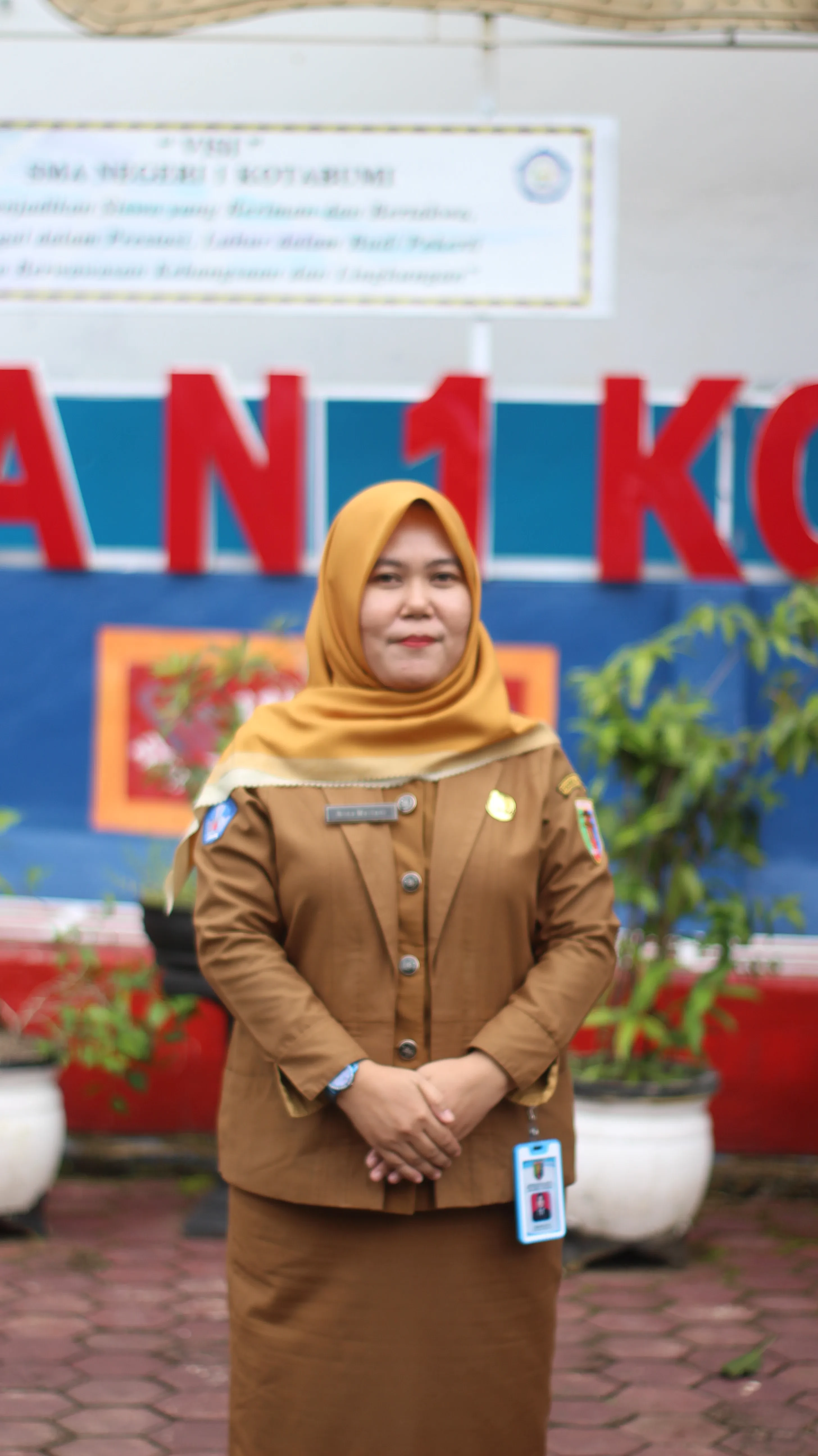 NINA MEILANI S.Pd